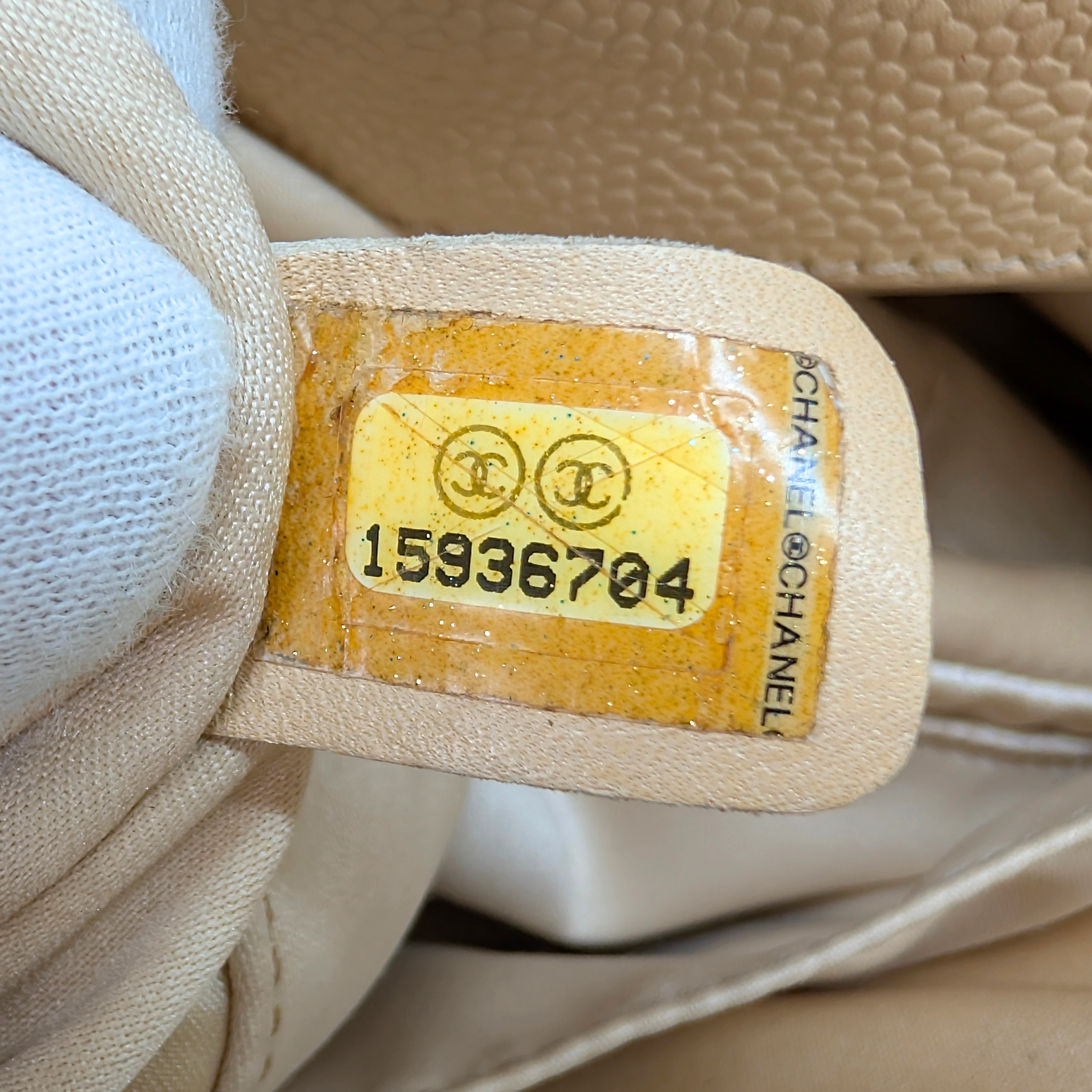 Chanel Quilted Caviar Grand Shopping Tote Beige